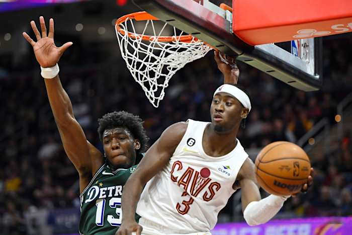 Mar 4, 2023; Cleveland, Ohio, USA; Cleveland Cavaliers guard Caris LeVert (3) passes beside Detroit Pistons guard James Wiseman (13) in the third quarter at Rocket Mortgage FieldHouse. Mandatory Credit: David Richard-USA TODAY Sports